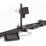 A bench to coil winder including traveling video microscope and remote touch screen console