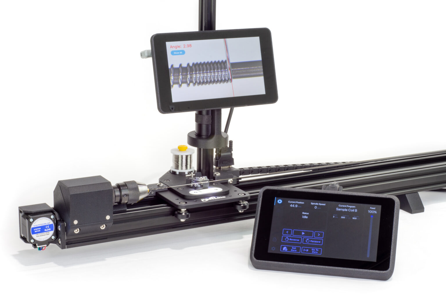 A benchtop coil winder with video microscope showing would coil and angle of coil There is a color LCD touch screen console in the foreground.