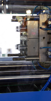 Promed Injection molding Machine graphic - supplier directory ad