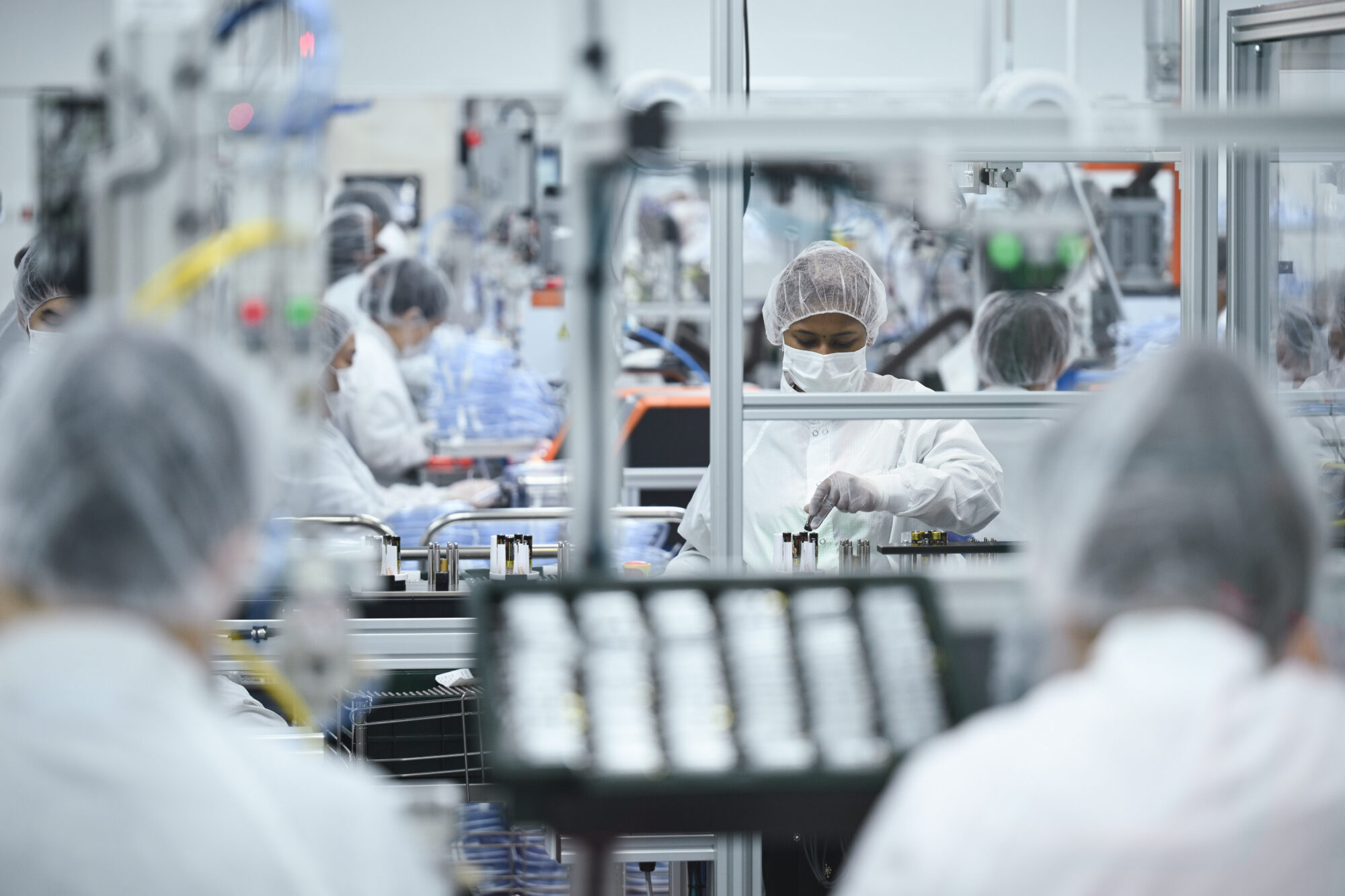 Team members in R&D lab